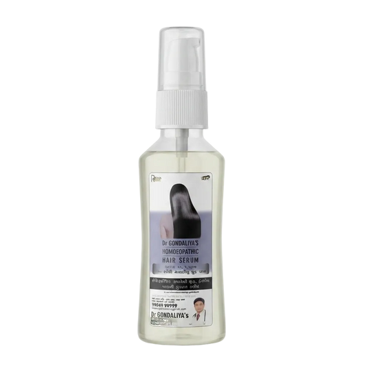 A clear plastic spray bottle of Dr. Gondalva's Hematogenic Hair Serum with a white spray cap and a white label featuring a black hair silhouette and text.